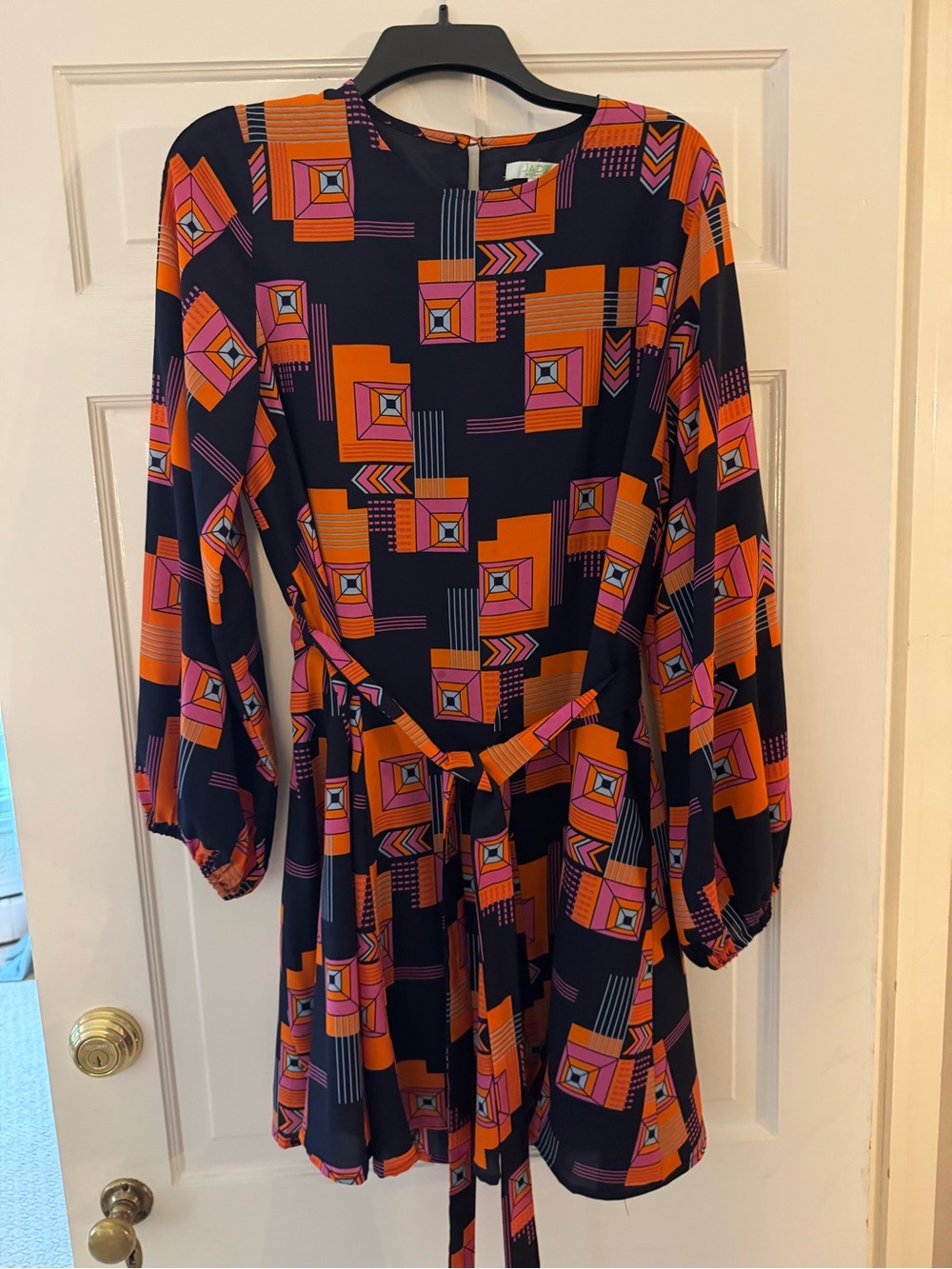 Jade Geometric Print Long-Sleeve Mini Dress in Navy with Orange & Pink